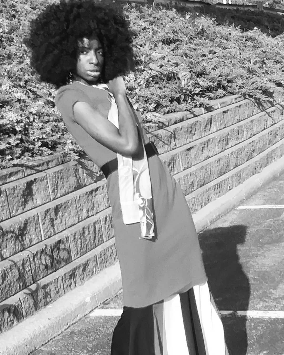 Artistic black and white portrait on stone steps
