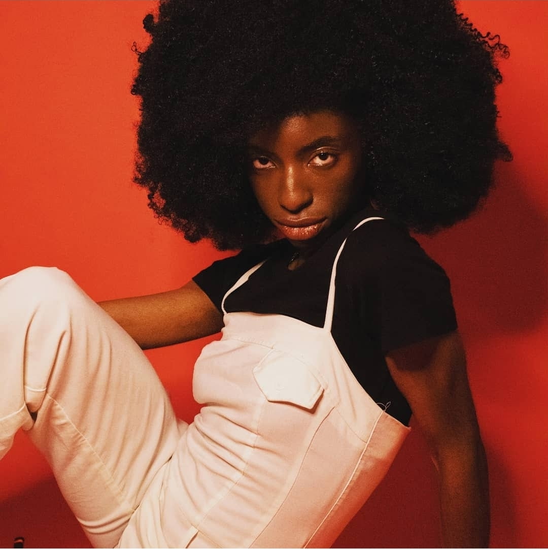 Artistic portrait with red background