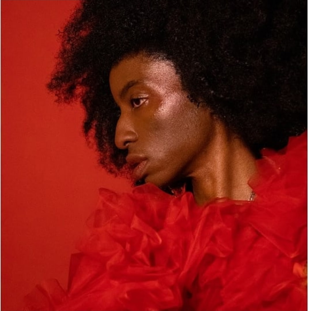 Dramatic red background portrait