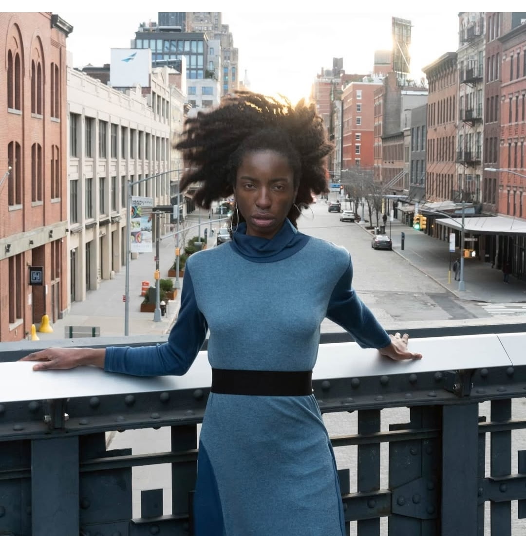 Urban rooftop portrait with city skyline